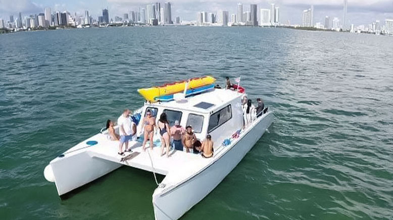 Catamaran Cruise w/ Jet Ski & Water Activities for 1 Person (ages 16+)