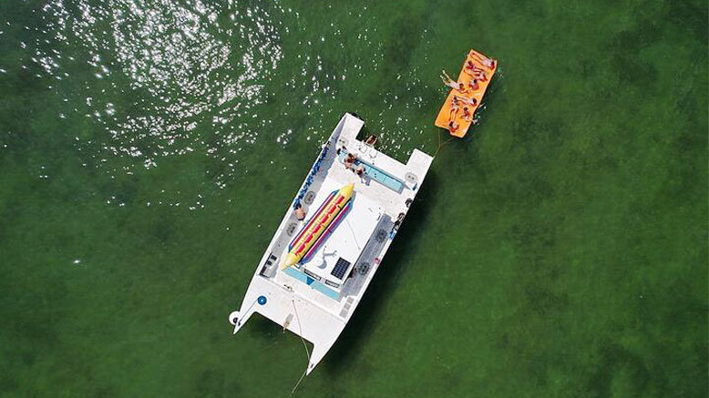 Catamaran Cruise w/ Jet Ski & Water Activities for 1 Person (ages 16+)