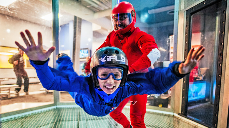 Indoor skydiving, surfing, & rock climbing for 1: iFLY first flight ticket and one-hour Flowride and iRock session